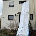 Goulotte à gravats Stortslurf® XL Ø80 cm posée sur le sol d'un chantier — aperçu